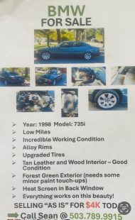 Year: 1998.  Dark green.  Low miles. Alloy rims/upgraded tires. Tan leather and wood interior. Heat screen in back window.